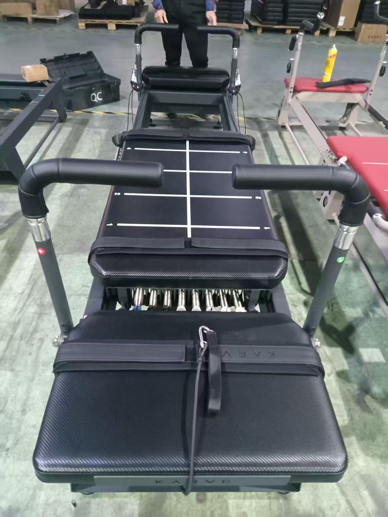 TX 3.0 on the production line — dual platforms and colour-coded spring pack